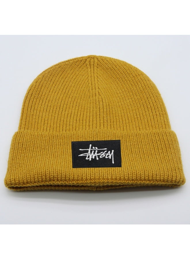Stüssy Signature Logo Beanie – Bold Mustard Yellow Streetwear Style Warm Winter Cap